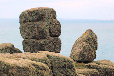 Watcher, near Pordenack Point, Cornwall. In the distance are the Isles of Scilly.