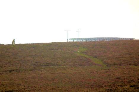 Cosmic energy of two kinds. Boswens menhir is on the side of Dry Carn, on top of which is a major air traffic control beacon for communicating with aircraft. Where truly lies the power?