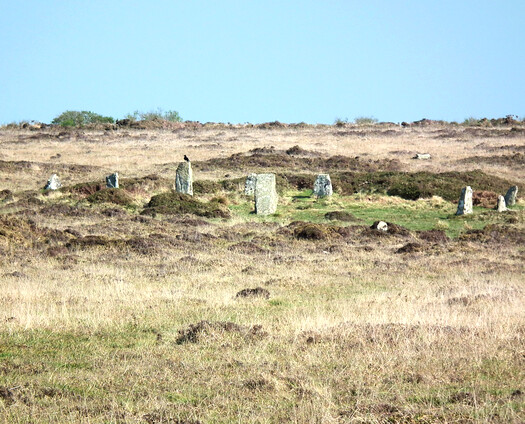 The Nine Maidens or Boskednan stone circle, on high moorland beneath the neolithic tor Carn Galva